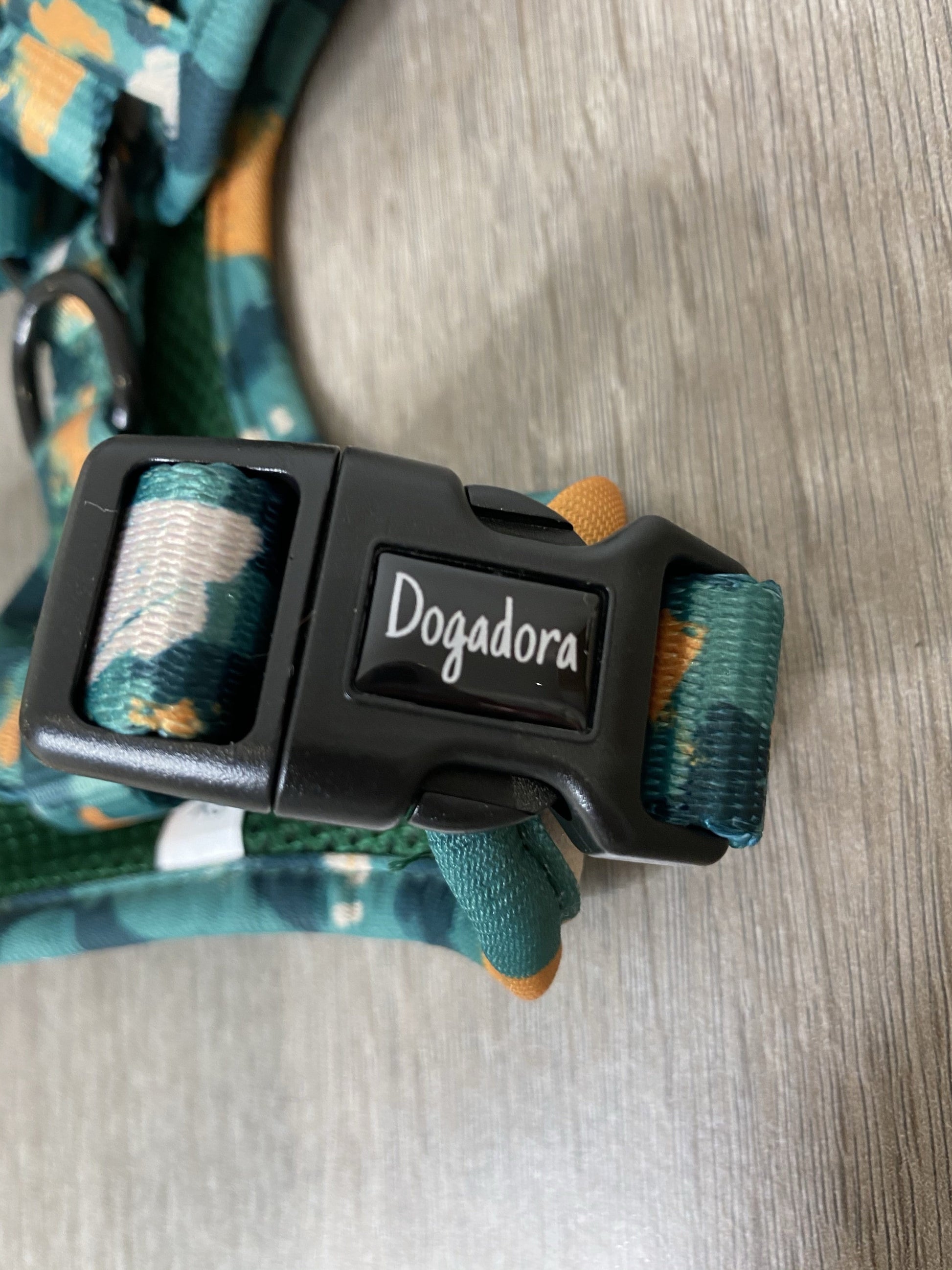 Durable and safe plastic clip on adjustable dog harness with Dogadora badge